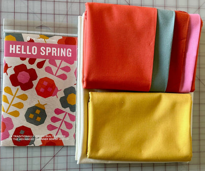 Hello Spring Quilt Kit-Includes fabric+pattern. Finished size 45.5" x 56". Featuring Kona Solids by Robert Kaufman as shown in pattern pic.