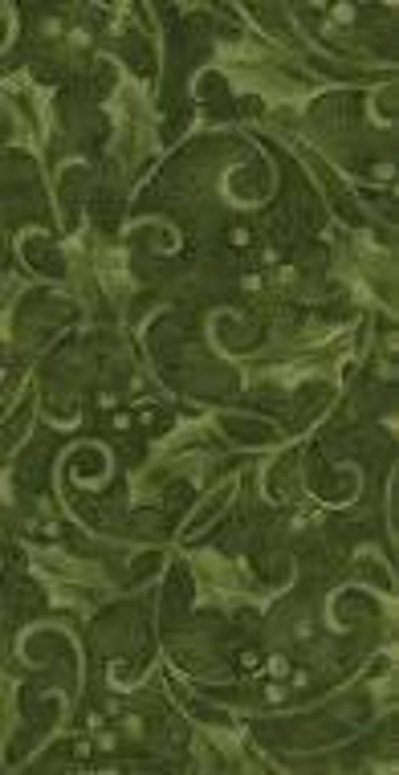 A dark green fabric with a repeating pattern of holly leaves and berries, intertwined with swirling vines.