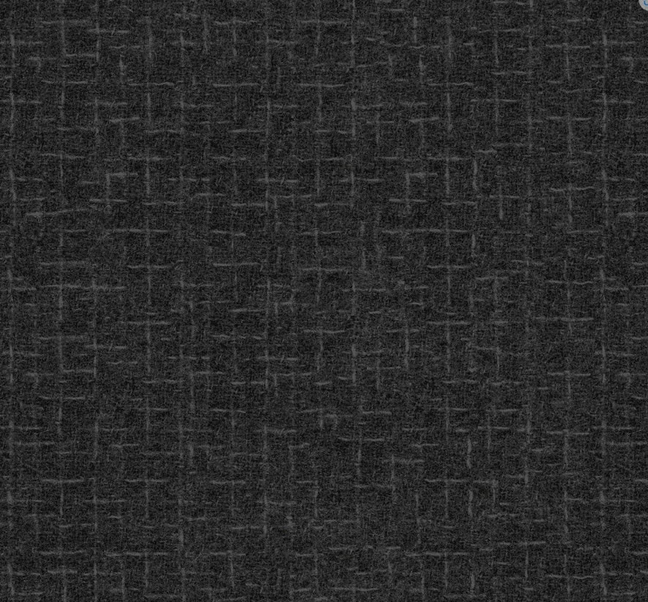 A close-up of dark gray flannel fabric with a subtle woven texture.
